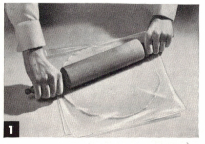 Roll Dough Between Squares Of Waxed Paper